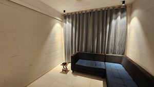 Living Room in 1 BHK Apartment at Khar West – for Rent