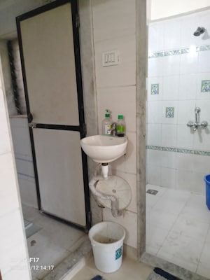 Bathroom in 1 RK Apartment at Jay Anand CHS, Chunabhatti – for Sale
