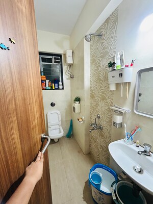 Bathroom in 2 BHK Apartment at Atul Blue Orbit, Malad West – for Rent
