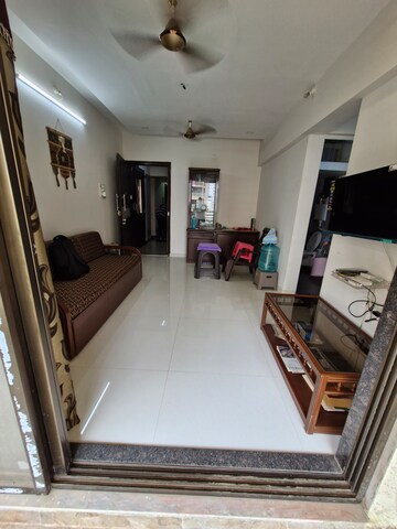 Living Room in 1 BHK Apartment at Poonam Park View, Virar West – for Sale