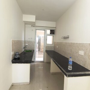 Kitchen in 2 BHK Apartment at Signature The Millennia 2, Garoli Kalan – for Rent