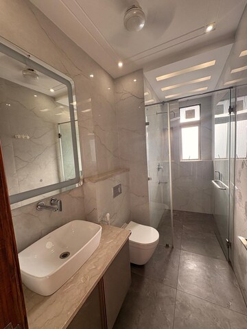 Bathroom in 4 BHK Builder Floor at Ansal Sushant Lok I, Sector 43 – for Rent