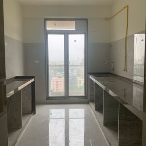 Kitchen in 3 BHK Apartment at Babhai Naka – for Rent