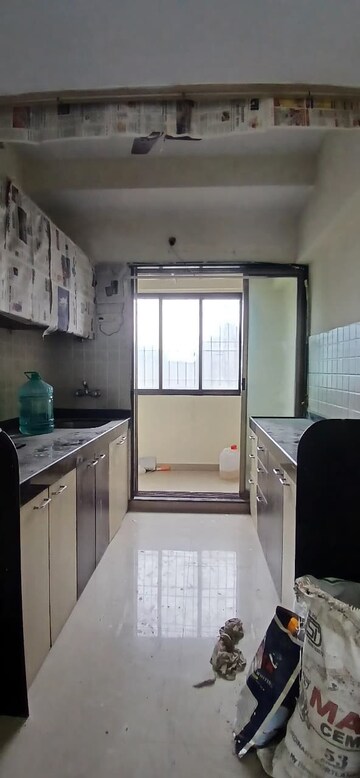 Kitchen in 2 BHK Apartment at Sunil Nivas Society, Andheri West – for Rent
