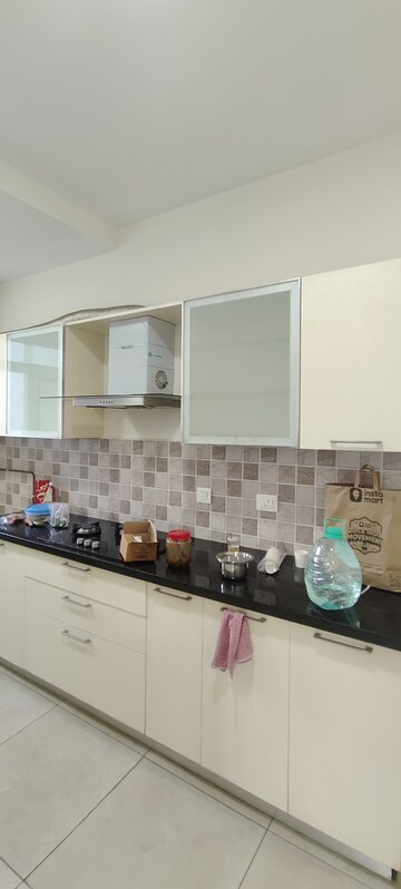 Kitchen in 2 BHK Apartment at Aryan Pebble Bay, Thanisandra – for Rent