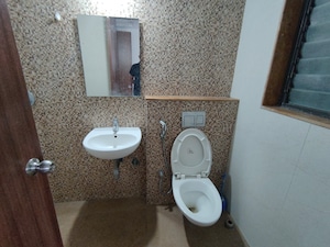 Bathroom in 1 BHK Apartment at Lodha Palava Downtown, Dombivli East – for Rent