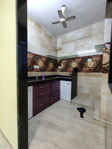 Bathroom in 1 BHK Apartment at Mohini Tower, Khar West – for Rent