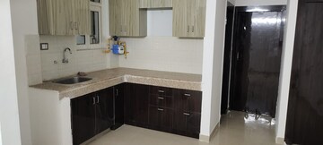 Kitchen in 2 BHK Apartment at Signature Orchard Avenue 2, Sector 93 – for Sale