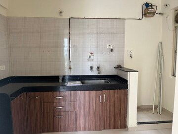 Kitchen in 1 BHK Apartment at Nyati Evita, Dhanori – for Sale