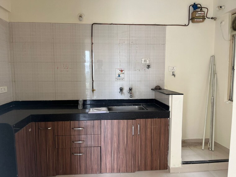 Kitchen, nyati-evita 1 Bedroom 644 Sq.Ft. Apartment In Dhanori Pune 9271783