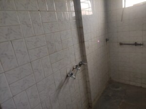 Bathroom in 1 BHK Apartment at Rasta Peth – for Rent