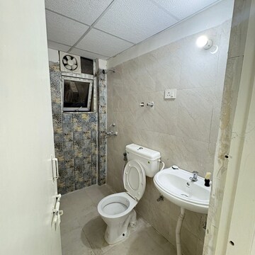 Bathroom in 2 BHK Apartment at Signature Global The Millennia, Garoli Kalan – for Rent