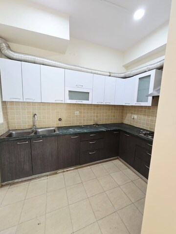 Kitchen in 3 BHK Apartment at Mahagun Moderne, Sector 78 – for Sale