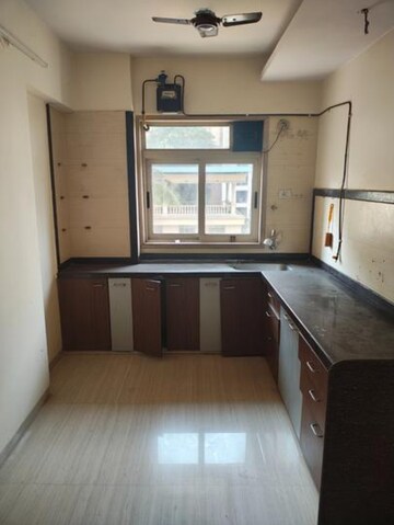 Kitchen in 2 BHK Apartment at Pride Presidency Luxuria, Ghodbunder Road – for Sale