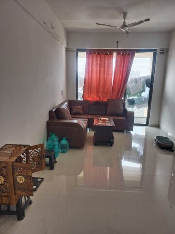 Living Room in 2 BHK Apartment at Pacifica North Enclave, Khodiyar – for Rent