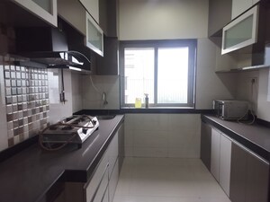 Kitchen in 2 BHK Apartment at Model Town, Andheri West – for Rent