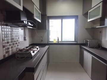 Kitchen in 2 BHK Apartment at Model Town, Andheri West – for Rent
