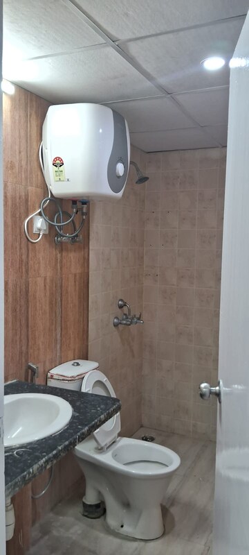 Bathroom in 2 BHK Apartment at JKG Palm Resort, Raj Nagar Extension – for Rent
