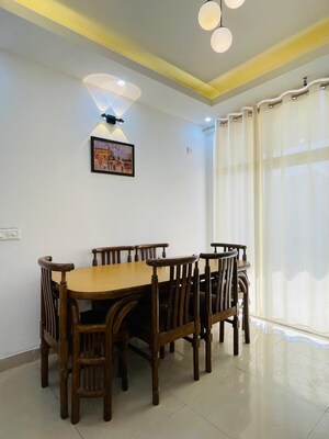 Living Room in 2.5 BHK Apartment at Nirala Aspire, Panchsheel Green – for Rent