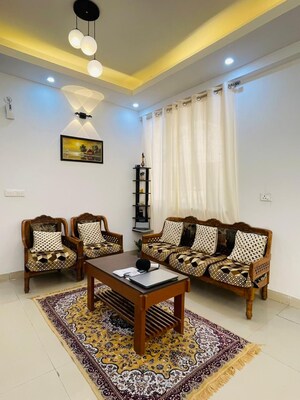 Living Room in 2.5 BHK Apartment at Nirala Aspire, Panchsheel Green – for Rent