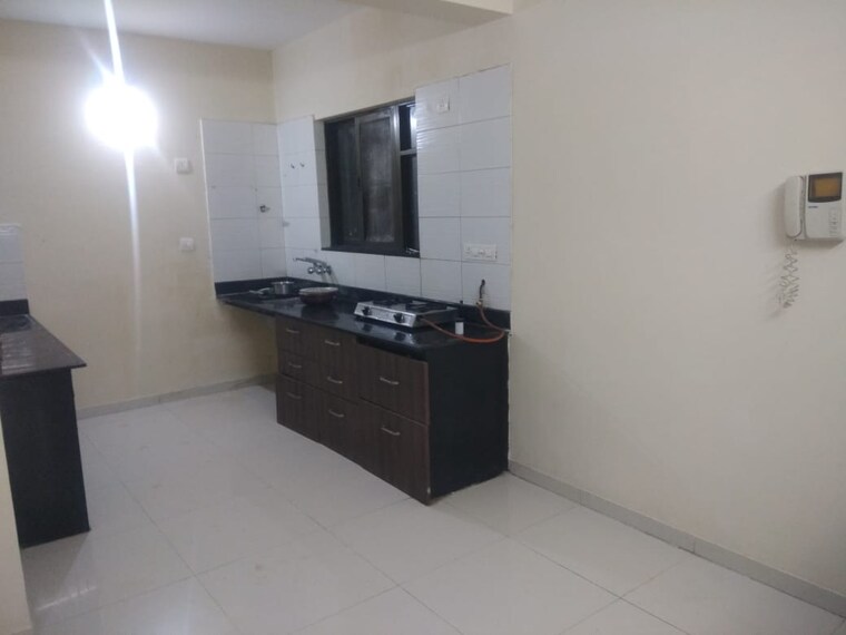 Kitchen, eshaan-apartments-karve-nagar 3 Bedroom 1249 Sq.Ft. Apartment In Karve Nagar Pune 9272230