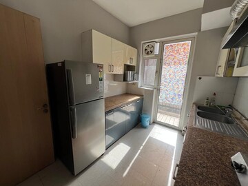 Kitchen in 4 BHK Apartment at DLF New Town Heights II, Sector 86 – for Rent