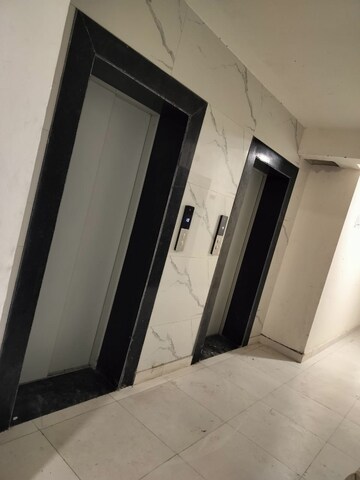 Building Lobby in 2 BHK Apartment at Charms Castle Phase II, Raj Nagar Extension – for Rent