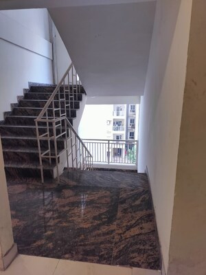 Staircase in 2 BHK Apartment at Charms Castle Phase II, Raj Nagar Extension – for Rent