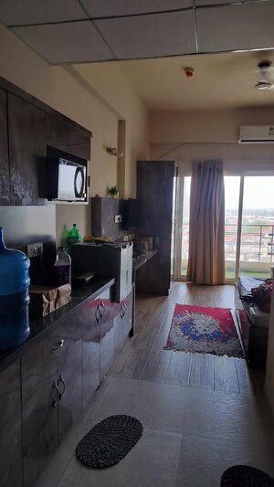 Kitchen in 1 BHK Apartment at Paramount Golfforeste, Zeta I Greater Noida – for Rent