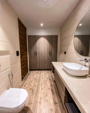 Bathroom in 3.5 BHK Apartment at Ambience Island Lagoon, Sector 24 – for Rent