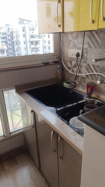 Kitchen in 3 BHK Apartment at Shubhkamna Advert Apartments, Sector 50 – for Sale