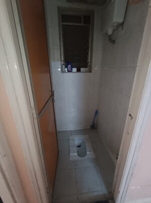 Bathroom in 1 BHK Apartment at Vireshwar Dham CHS, Kopar Khairane – for Rent
