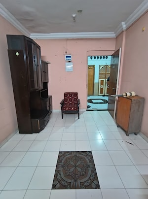 Living Room in 1 BHK Apartment at Vireshwar Dham CHS, Kopar Khairane – for Rent