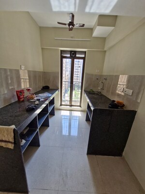 Kitchen in 2 BHK Apartment at Rustomjee Avenue L1, Virar West – for Rent