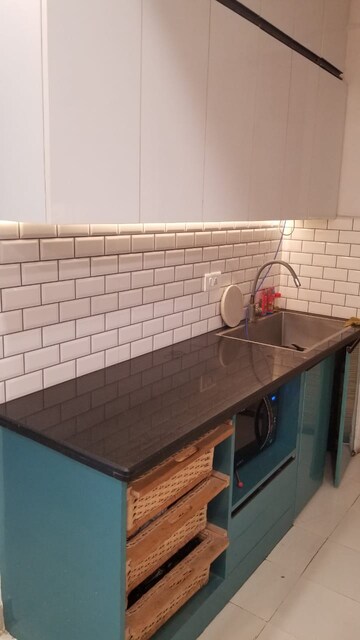 Kitchen in 3 BHK Apartment at Amrapali Zodiac, Sector 120 – for Rent