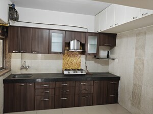 Kitchen in 2 BHK Apartment at Hiranandani Meadows, Manpada – for Rent