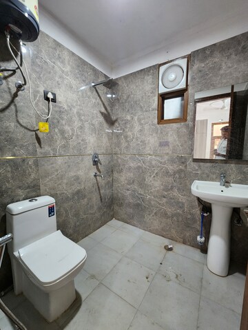 Bathroom in 3 BHK Builder Floor at Chattarpur – for Rent