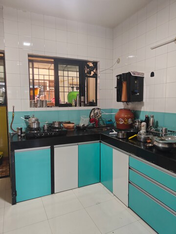Kitchen in 3 BHK Apartment at Radhai Nagari Apartments, Pimple Saudagar – for Rent