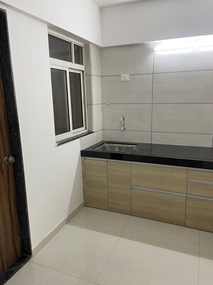 Kitchen in 2 BHK Apartment at Choice Goodwill Metropolis West, Lohgaon – for Rent