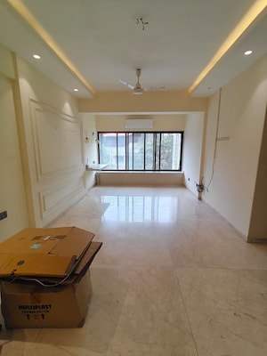 Living Room in 2 BHK Apartment at Magnum Tower CHS, Andheri West – for Rent