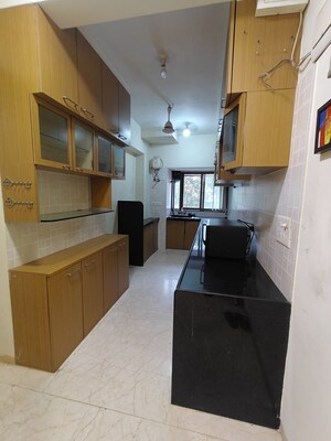 Kitchen in 2 BHK Apartment at Magnum Tower CHS, Andheri West – for Rent