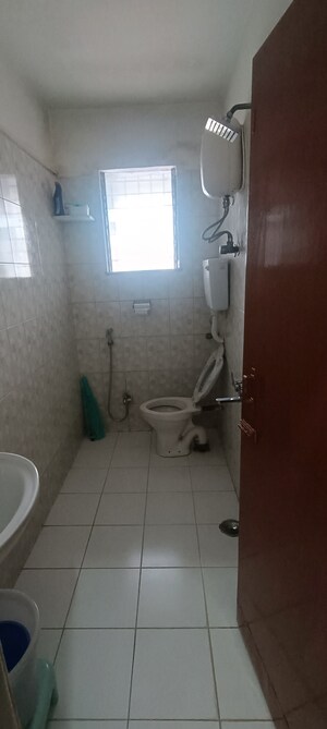 Bathroom in 2 BHK Apartment at Anita Accord, Kandivali East – for Rent