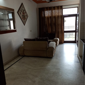 Living Room in 1.5 BHK Villa at Sector 23 – for Rent