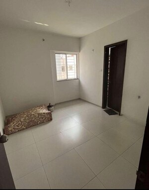 Master Bedroom in 2 BHK Apartment at Royal Orange County, Rahatani – for Sale