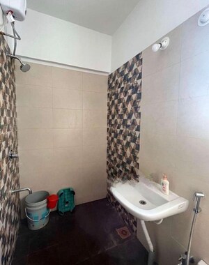 Bathroom in 2 BHK Apartment at Royal Orange County, Rahatani – for Sale