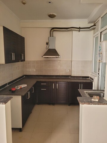 Kitchen in 2 BHK Apartment at Amrapali Zodiac, Sector 120 – for Rent
