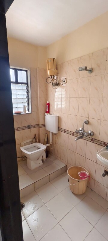 Bathroom in 2 BHK Apartment at Dheeraj Darshan, Jogeshwari East – for Rent