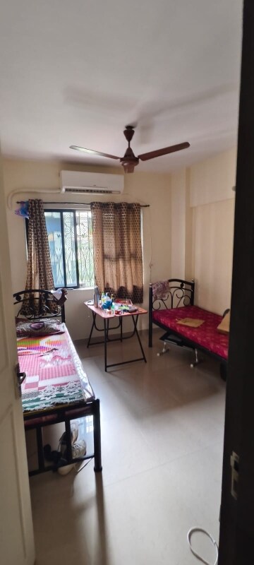 Bedroom in 2 BHK Apartment at Dheeraj Darshan, Jogeshwari East – for Rent