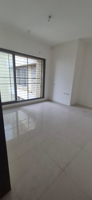 Room in 2 BHK Apartment at Acme Ozone, Manpada – for Sale