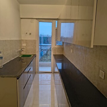Kitchen in 2 BHK Apartment at Signature The Millennia 2, Garoli Kalan – for Rent